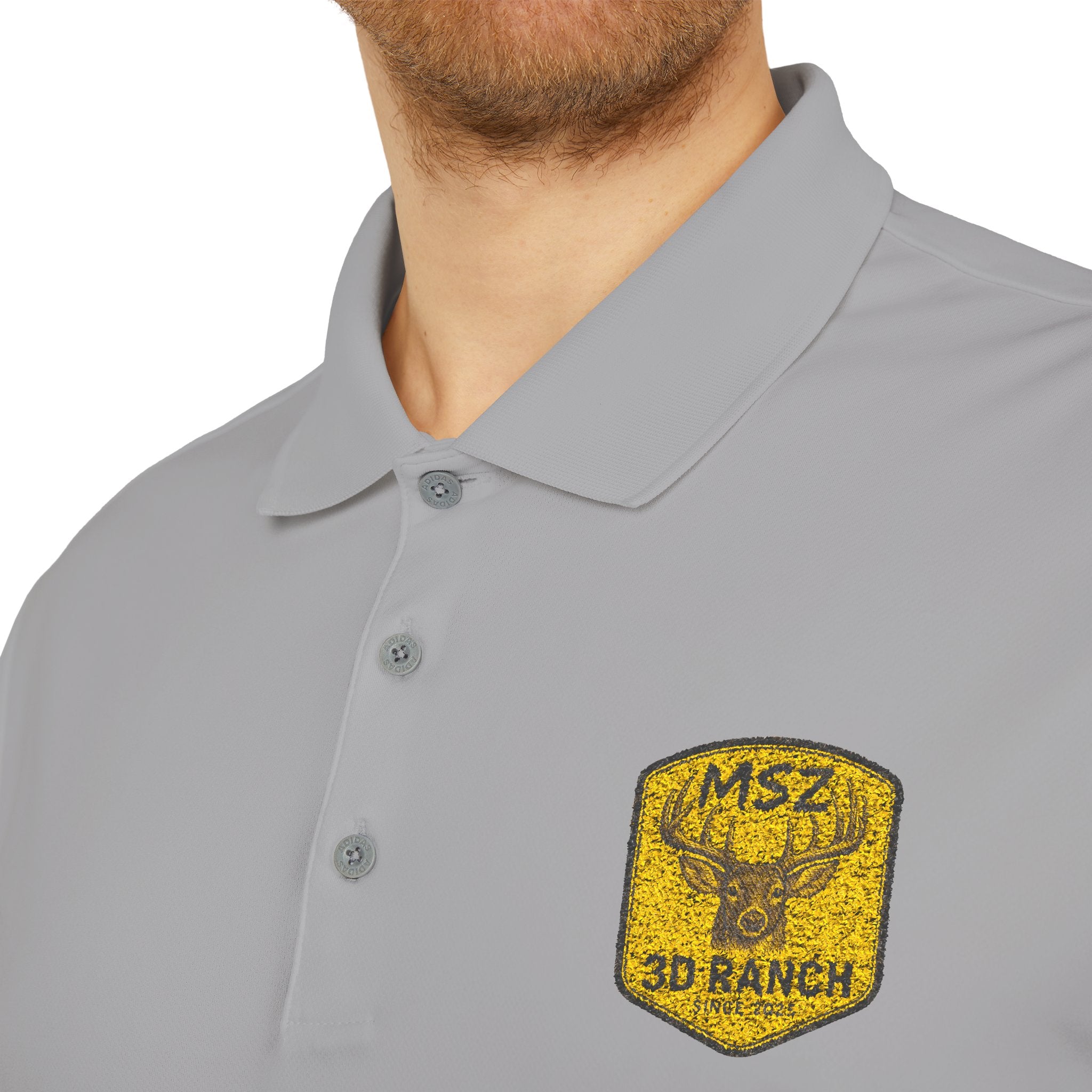 Performance Polo — Gold Shield Patch Polo Shirt